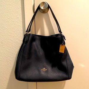 Coach triple compartment purse.